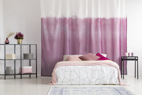 Bedroom with dyed curtain