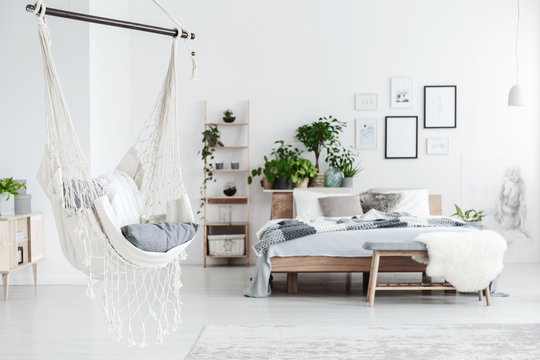 White hammock in bedroom interior