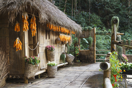 Wooden bamboo house in forest.