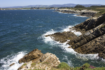 Illa Pancha in Ribadeo, Spain, a beautiful island with two lighthouses guarding the Eo estuary that delimits the border between Galicia and Asturias