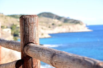 View through the Wooden fence on spanish sea coast