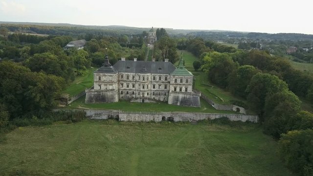 Aerial drone footage with approximation to a medieval castle in eastern Europe (4K, 25fps)