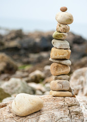 Fototapeta na wymiar A stack of stones on the beach