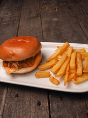 Fish burger with French fries