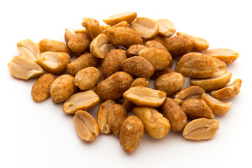 Peeled peanuts on the isolated background.