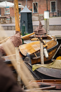 Traditional Dutch Botter Fishing Boats in the small Harbor of a Historic Fishing Village