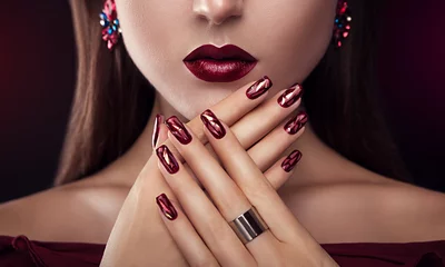  Beautiful woman with perfect make-up and manicure wearing jewellery © maryviolet