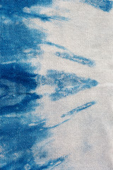 The fabric indigo tie dye as a background and texture.