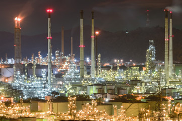 Fototapeta na wymiar Oil refiery plant,oil tank and oil storage at sunset.Thai oil refinery in Thailand.