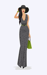 Fashion woman in hat and long dress.
