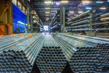 Old factory of auto components production. Warehouse of an aluminum pipes
