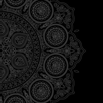 Delicate white mandala pattern in boho style on black background