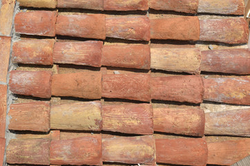 Surface of roof tiles of an old coastal village house