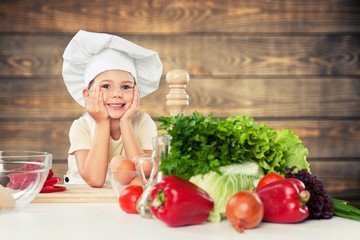 Adorable little girl preparing healthy food