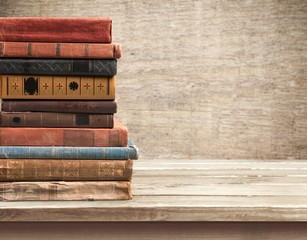 Old books on wooden table