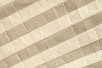 Texture of paper beige with stripes. Background of light brown color.