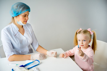 Doctor vaccinating a kid