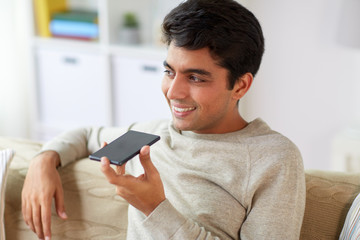 man using voice command recorder on smartphone