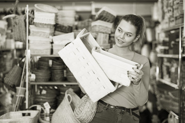 girl customer standing with wicker basket