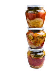 Glass jars with different colorful canned salads isolated on white background with place for text