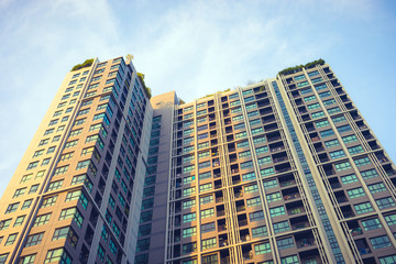 Fototapeta na wymiar Modern apartment building exterior . blue sky