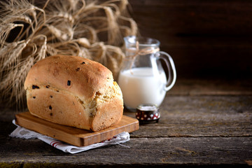 Homemade onion bread on an old wooden background. Rustic style.