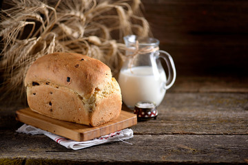 Homemade onion bread on an old wooden background. Rustic style.