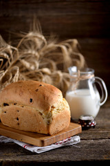 Homemade onion bread on an old wooden background. Rustic style.