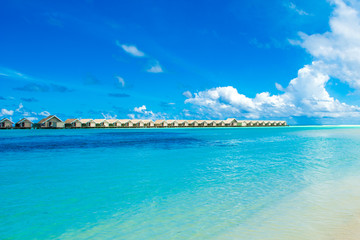 Wooden villas over water of the Indian Ocean, Maldives