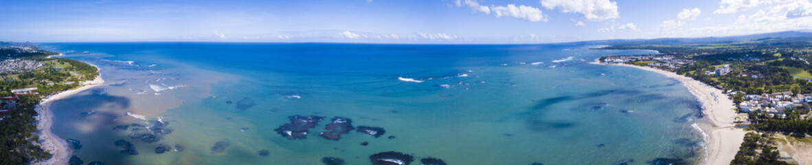 Fototapeta na wymiar 180 degree aerial panorama of beaches and resorts in the Dominican Republic.