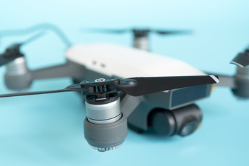 Toy Quadrocopter on blue