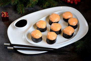 Homemade hot rolls baked with a sauce of two kinds of cheese.