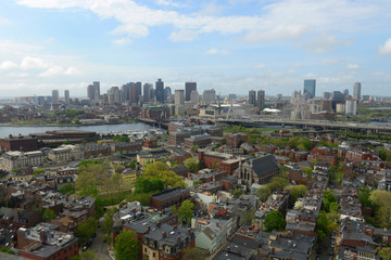 Boston City Skyline aerial view including Custom House and Financial District skyscrapers, from the top of Bunker Hill Monument, Boston, Massachusetts, USA.