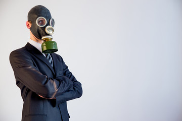 Businessman in a gas mask