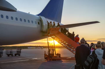 Foto op Aluminium People boarding plane, travelers  © Victor