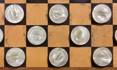 White Pieces on a Checkerboard
