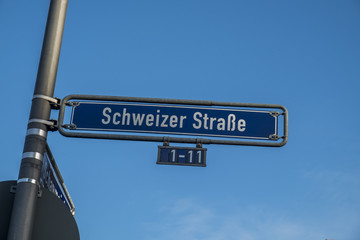 Fototapeta premium street sign schweitzer strasse in frankfurt