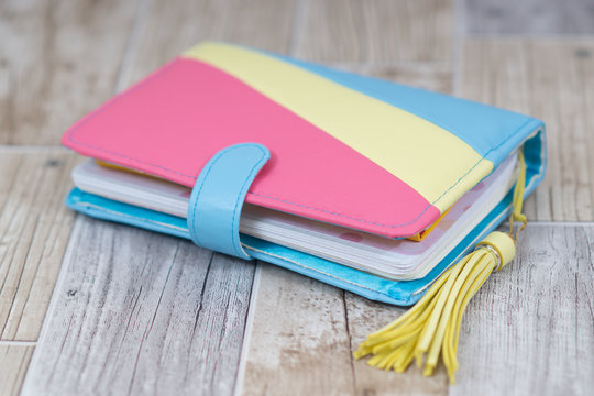 Handmade three-color pink yellow blue leather notebook, planner for business or education