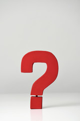 red three-dimensional question mark