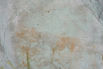 Wall fragment with scratches and cracks