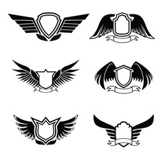 Blank or empty shields with wing and ribbons