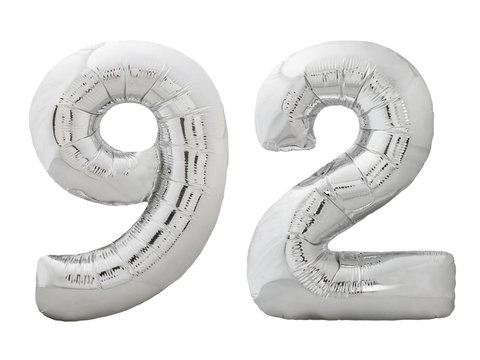 Silver number 92 ninety two made of inflatable balloon isolated on white