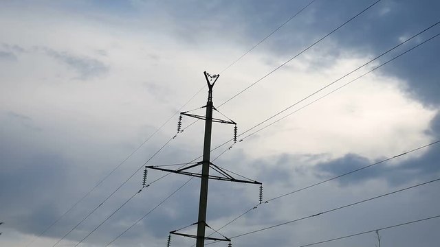 post electricity with wires on blue sky background outdoors