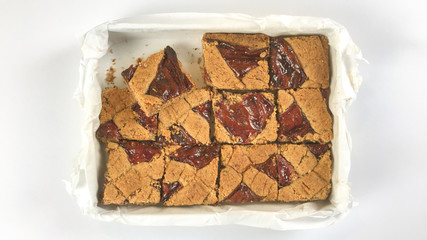 cakes with jam in a box, white background