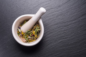 Herbal and white porcelain mortar