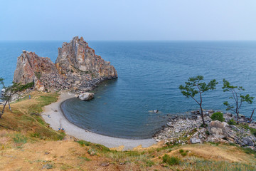 Shaman Rock in the early morning. Lake Baikal. Olkhon Island. Russia