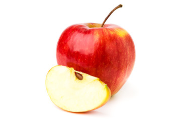 Ripe red Apple and slice, closeup.
