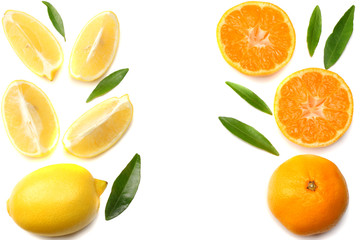 mandarin with slices, lemon and green leaf isolated on white background top view
