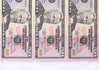 Three 50 dollar banknotes isolated on white background.
