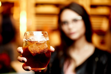 Cocktail in a hand 